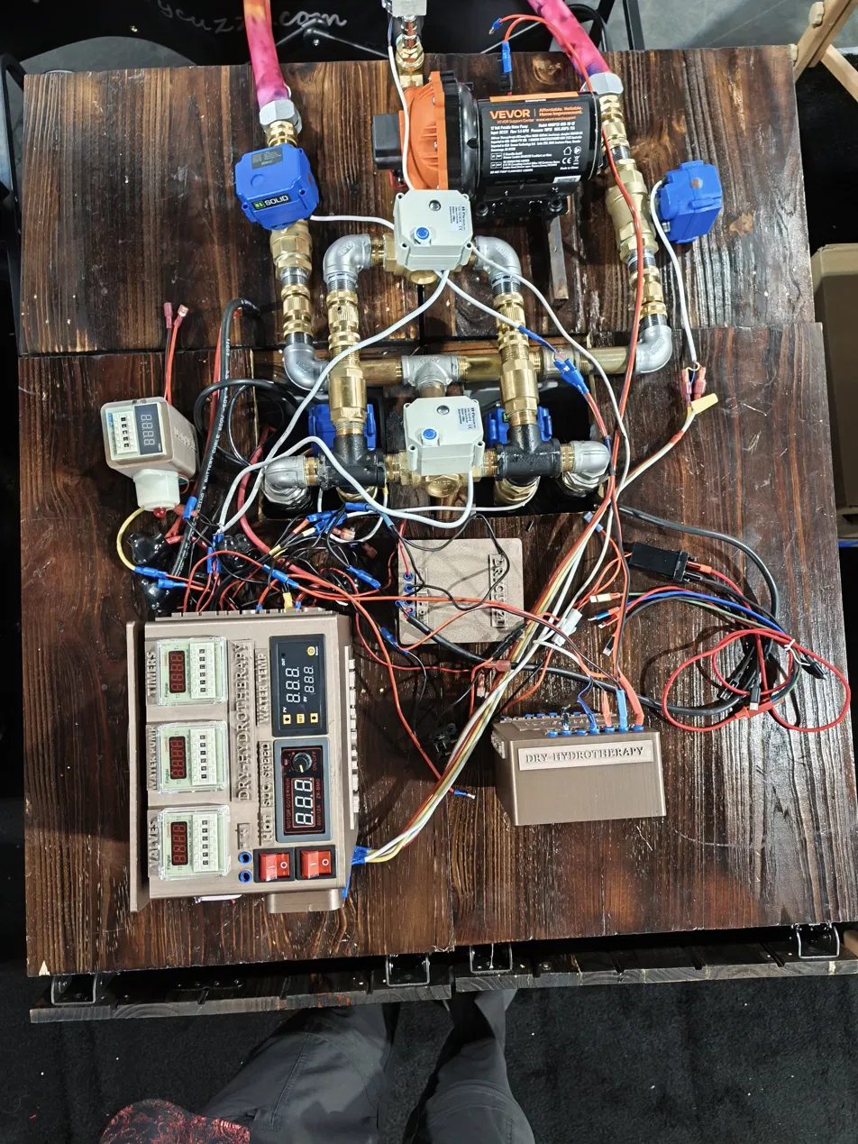 Coma Bed control panel with independent timers, water-temp readout and pump-speed control